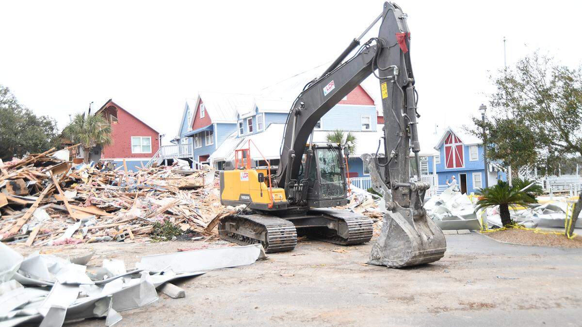 ArborNature Site Solutions excavator performing demolition work